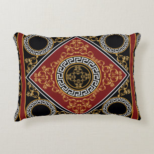 Golden floral baroque element with greek motif on decorative cushion