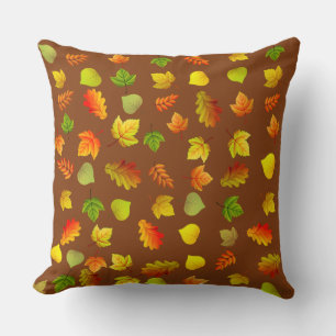 Golden, Green, Orange Autumn Leaves on Brown Cushion