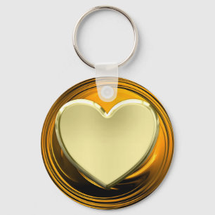 Golden heart on golden liquid key ring