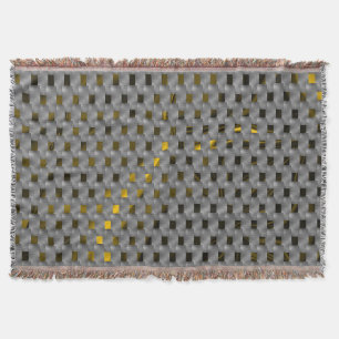 Golden image below grey plates, oblong squares throw blanket