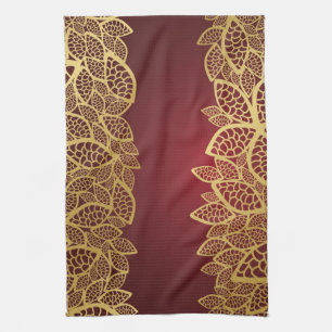 Golden leaf lace on red background tea towel