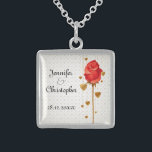 Golden Love Hearts and Red Wedding Sterling Silver Necklace<br><div class="desc">An elegant necklace to celebrate your nuptials featuring golden coloured love hearts hanging behind a long stemmed red rose bud. The background is a subtle pattern of love hearts. The text is fully customisable for your own special occasion.</div>