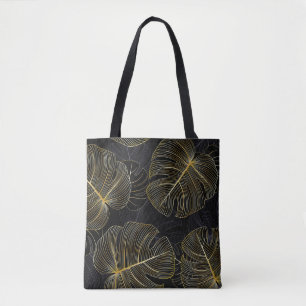 Golden monstera leaves, romantic seamless floral. tote bag