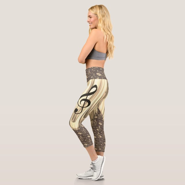 Golden Music Pick – Treble Clef Art Capri Leggings (Left)