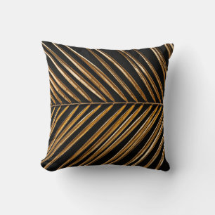 Golden painted date palm leaf closeup on abstract  cushion