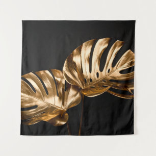 Golden painted date palm leaf closeup on abstract tapestry