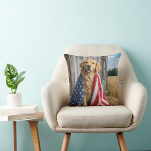 Golden Retriever Draped in an American Flag Cushion