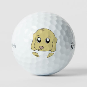 golden retriever peeking golf balls