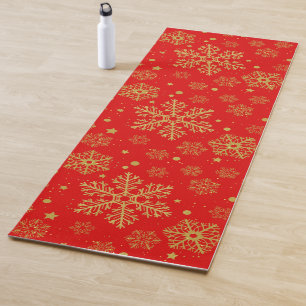 Golden snowflakes on red yoga mat