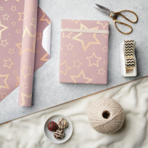 golden stars pink wrapping paper
