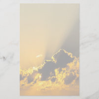 Golden Sunset Illuminating a Cloud