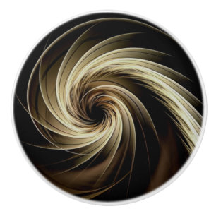 Golden Swirl Across Black Ceramic Knob