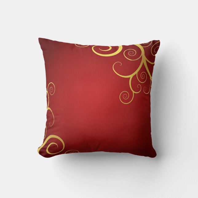 Golden swirls on deep red cushion (Front)