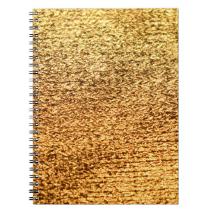 Golden textile: glamourous macro background. notebook