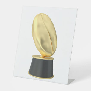 Golden trophy with coffee bean pedestal sign