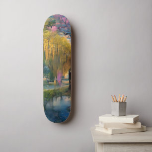 Golden Willow tree at sunset by the pond Skateboard