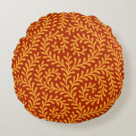 Golden Yellow Leafy Vine Pattern Round Cushion<br><div class="desc">Seamless repeating pattern featuring stylized golden yellow leafy vine motifs against a rich terracotta red background.</div>