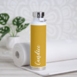 Golden Yellow Personalised Wedding Bridesmaid Water Bottle<br><div class="desc">Gift your wedding bridesmaid or maid of honour with this trendy, vacuum Insulated water bottle that features her name in white stylised script on a golden yellow colour background designed to match your wedding colour scheme. Personalise bottle by editing and replacing name with your own as desired. Select your water...</div>