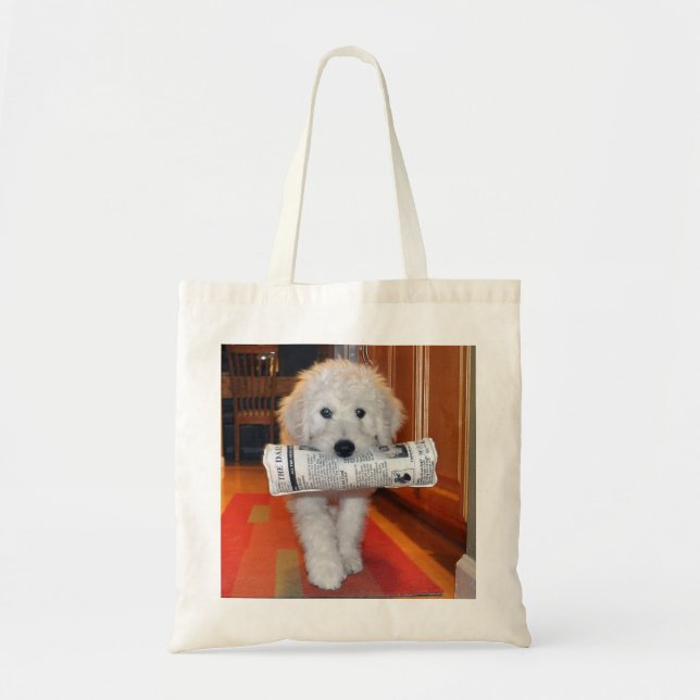 Goldendoodle carrying newspaper toy tote bag (Front)