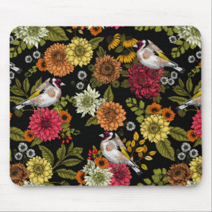 Goldfinches in the garden on black mouse pad