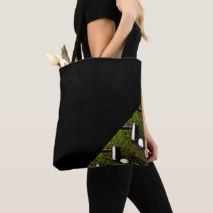 Golf bag with golf ball and putter