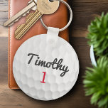 Golf Ball Dimples with Black Name Red Number Key Ring<br><div class="desc">A sporty and manly pattern for the guys and boys in your family.This sports design is perfect for any athlete. It looks like a photo of a gold ball. You can use this as a Happy Birthday favor and include the number years old in the number area.</div>