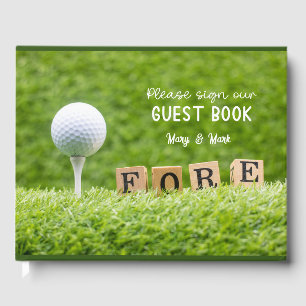 Golf ball is on green grass with word FORE Guest Book
