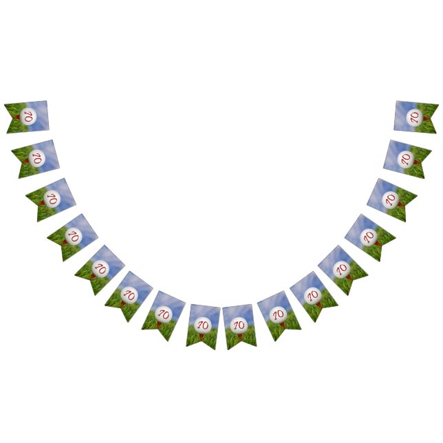 golf ball on tee in grass for 70th birthday bunting  (All)