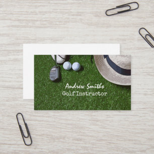 Golf ball shoe putter on green golfer business car card