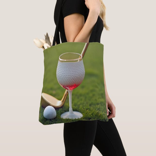 Golf Ball Wine Glass With Gold Putter Tote Bag (Close Up)
