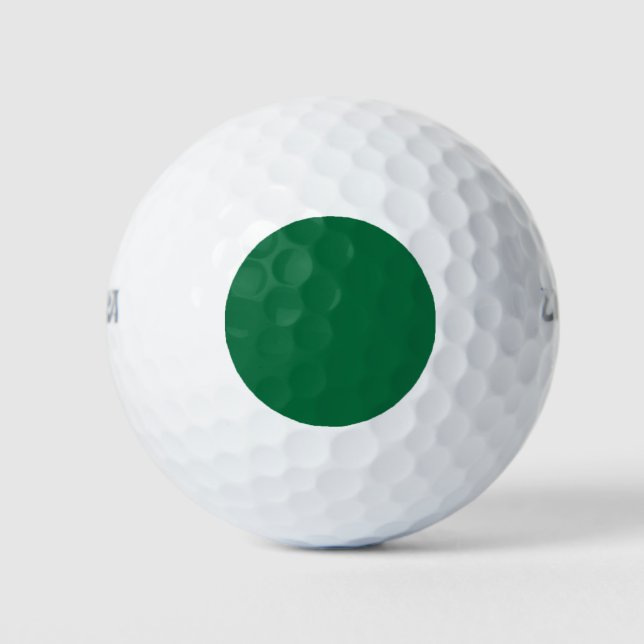 Golf Ball with a green dot hot spot locator guide (Front)