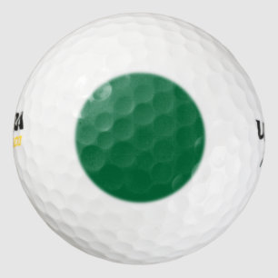 Golf Ball with a green dot hot spot locator guide