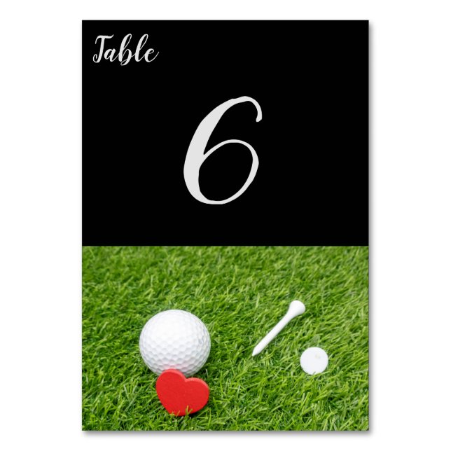 Golf ball with tee and red heart on green wedding table number (Front)