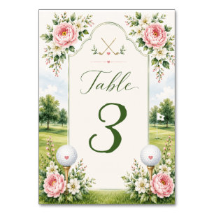 Golf ball with tee and red heart on green wedding table number