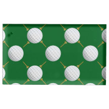 Golf balls and Tees on Green