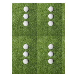 Golf Balls are on green grass Tablecloth