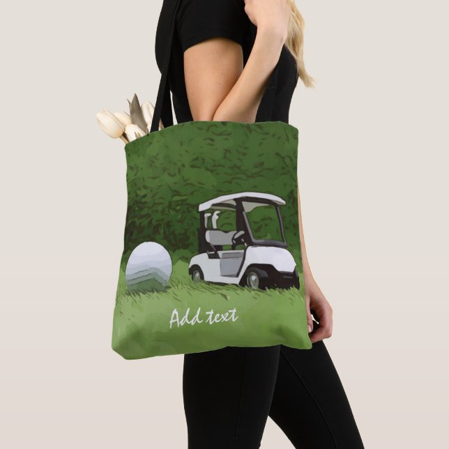 Golf cart and golf ball on green grass Golfer Tote Bag (Close Up)