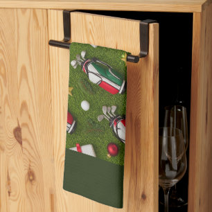 Golf Christmas themed on green grass Tea Towel