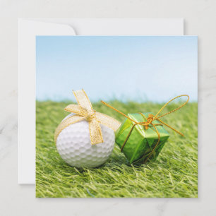 Golf Christmas with golden ribbon on green grass Holiday Card