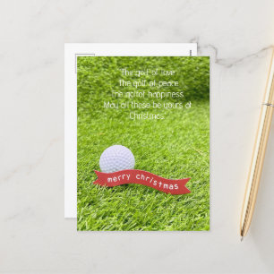 Golf Christmas with golf ball on green grass Holiday Postcard