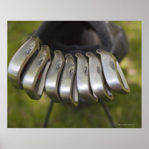 Golf club heads in a bag. Three through nine Poster