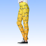 Golf clubs pattern orange yellow sporty<br><div class="desc">Fun golfing-patterned leggings with a background in orange merging into yellow. The repeating pattern is created with crossed golf clubs and golf balls,  on a gradient ombre background.</div>