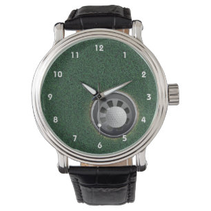 Golf Cup and Ball on the Greens Watch