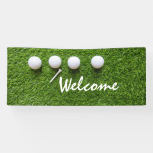 Golf welcome banner golf balls and tee on green
