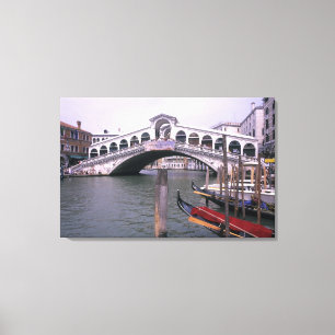 Gondolas and tourists near the Rialto Bridge Canvas Print