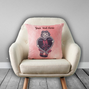 Goth Rag Doll Holding Black Heart on Shades Pink Cushion