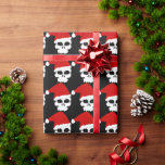 Goth Skulls Wearing Christmas Santa Hats on Black Wrapping Paper<br><div class="desc">Goth Skulls Wearing Christmas Santa Hats all on a Black Background Christmas Wrapping Paper features.rows of white skulls wearing festive red Santa hats on a black background. You can change the background and images, and add your own text and images if you prefer. Come to our store at zazzle.com/TheRightNote when...</div>
