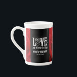 Gothic Red Roses Love at First Bite Wedding Bone China Mug<br><div class="desc">Celebrate your Gothic-themed special day with this striking oversized coffee mug, which features the sappy, pun-filled sentiment, "Love at First Bite" in Goth-inspired lettering (and the outline of a rose, standing in for the letter 'O'). Customise with newlyweds' names and wedding date. Design © W.H. Sim. See more at zazzle.com/expressionsoccasions...</div>