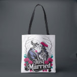 Gothic Romance Skeleton Couple Wedding Tote Bag<br><div class="desc">Celebrate unconventional love and carry it with you wherever you go. This beautifully illustrated tote bag features a "Just Married" skeleton couple, making it a perfect, hauntingly sweet accessory for running errands, carrying books, or even as a unique gift bag for a wedding party. A stylish and practical tribute to...</div>