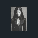 Gothic Velvet Hooded Portrait Closed Eyes Canvas Print<br><div class="desc">A mesmerizing black-and-white portrait shows a woman with eyes softly closed beneath a deep velvet hood. Sleek dark hair parts down the center while an elaborate high-necked gothic gown with structured corset and plunging neckline accentuates her graceful form. Intricate metallic details and ornate earrings add subtle luxury against a textured...</div>